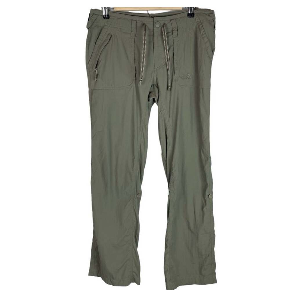 The North Face army green nylon outdoors hiking pants roll tab leg